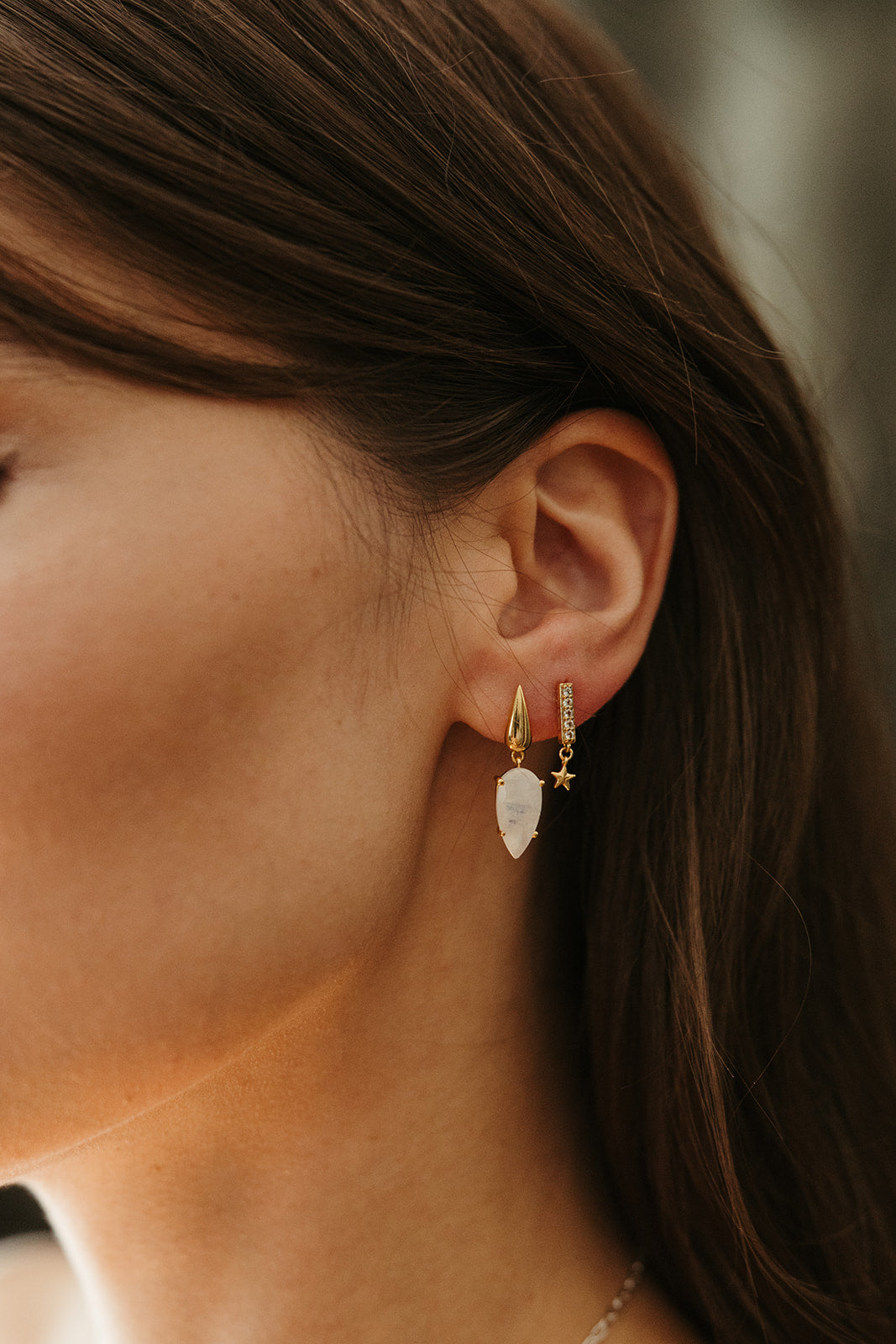 gold and white topaz french 75 earrings with star dangle sierra winter