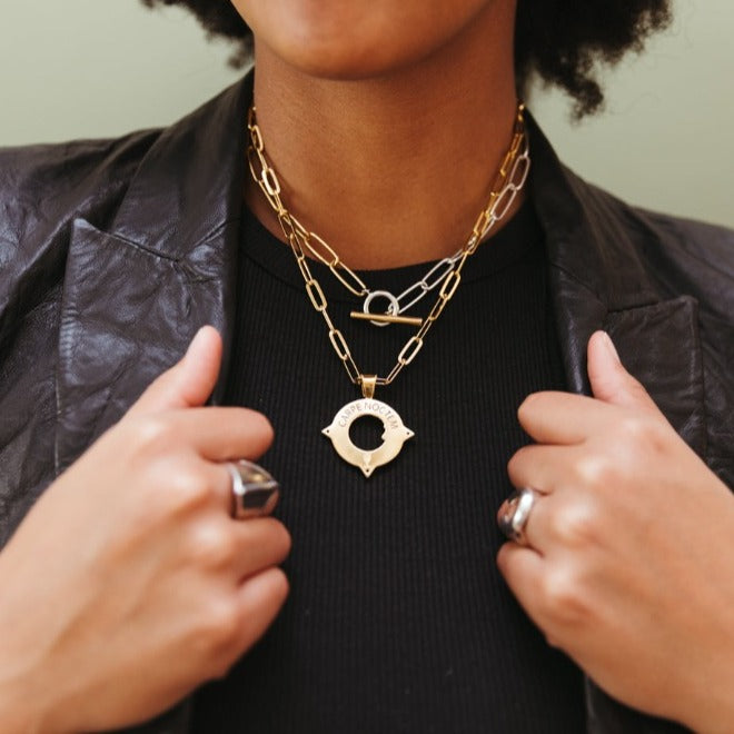 sierra winter mixed metal crescent moon midnight pendant