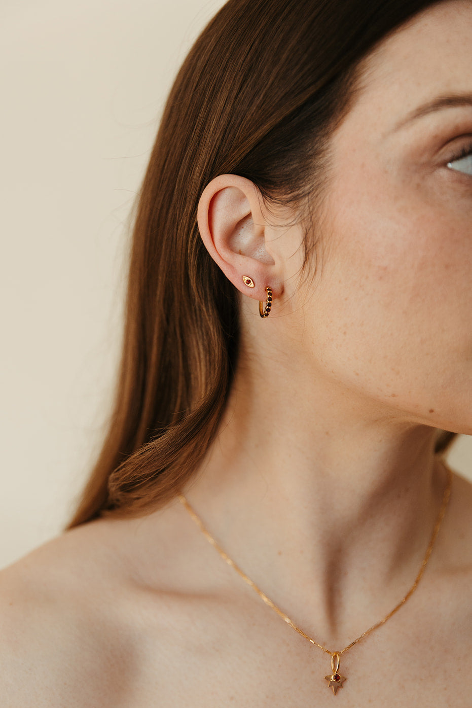 gold vermeil and garnet evil eye birthstone stud earrings