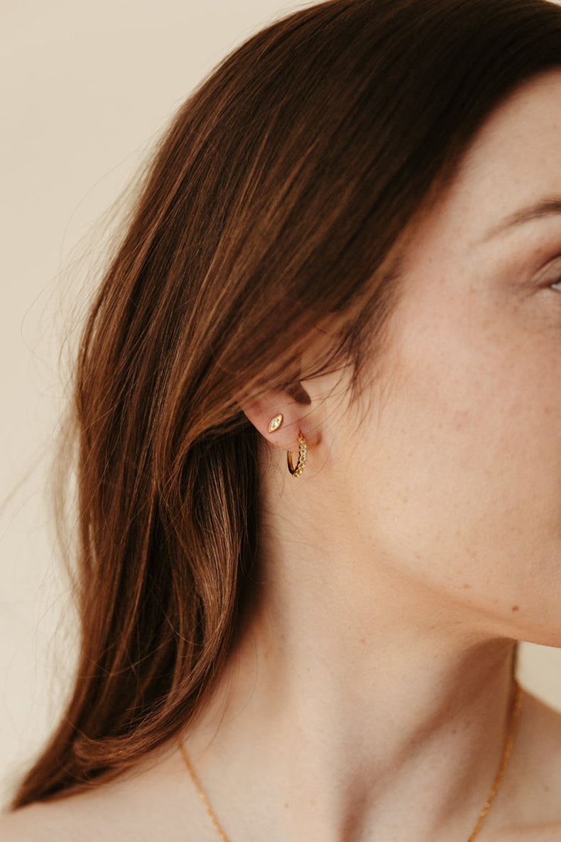 gold vermeil and peridot evil eye birthstone stud earrings