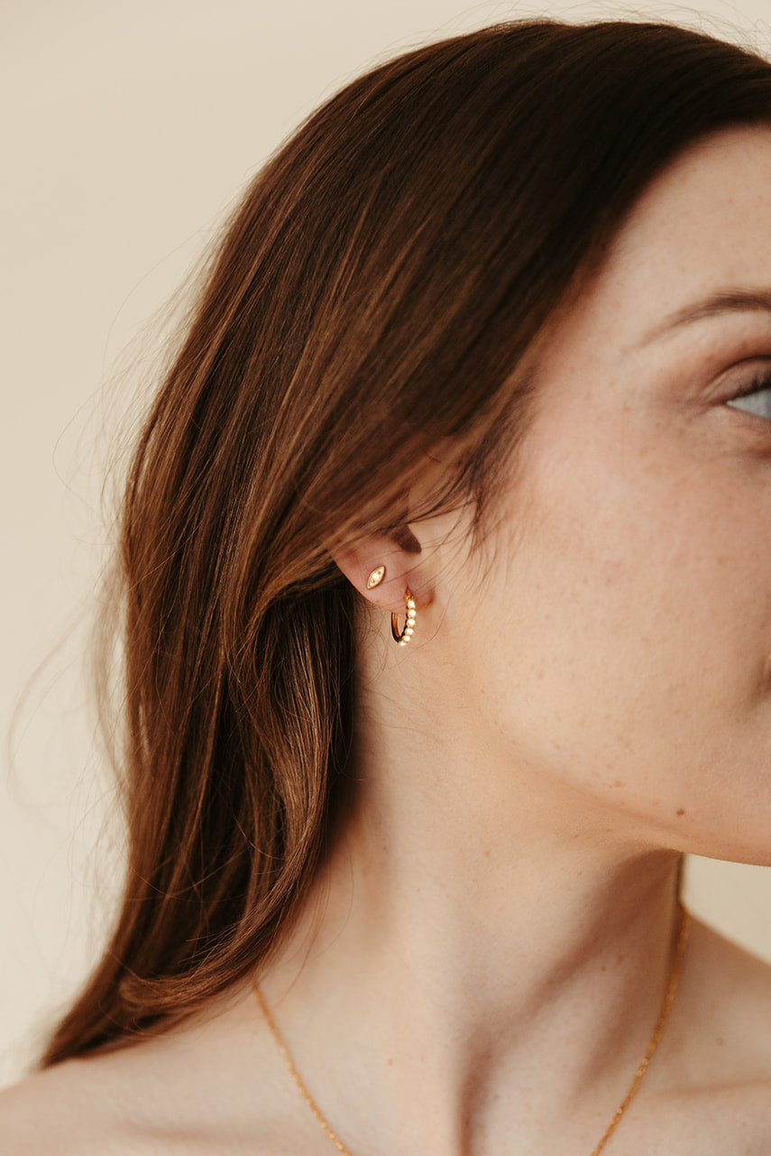 gold vermeil and pearl evil eye birthstone stud earrings