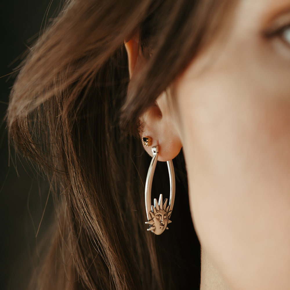 
                      
                        silver sun and moon hoop earrings sierra winter
                      
                    