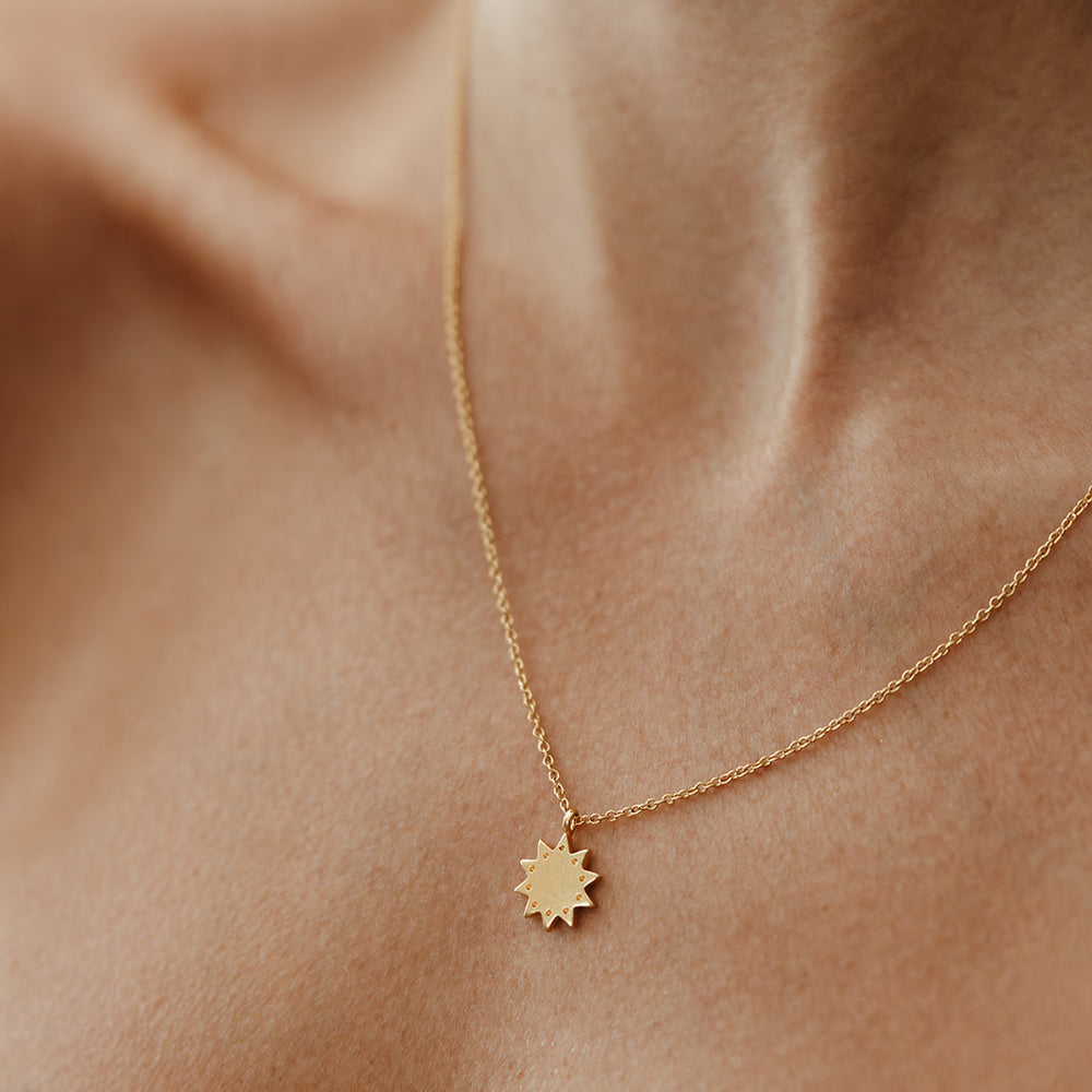 
                      
                        gold star inspired luster pendant necklace sierra winter
                      
                    