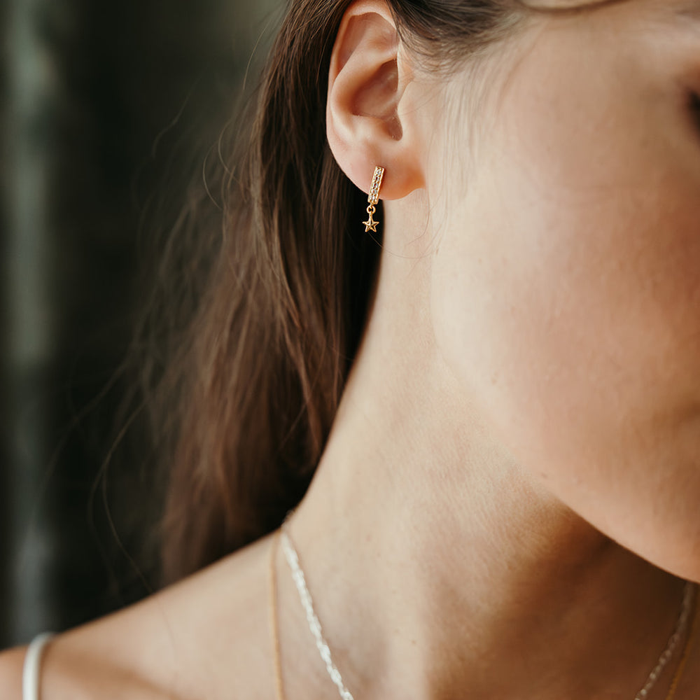 gold and white topaz french 75 earrings with star dangle sierra winter