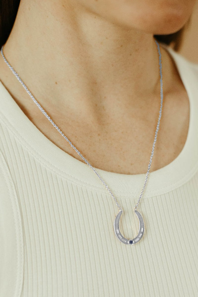 
                      
                        sterling silver and blue sapphire oakley horseshoe pendant necklace
                      
                    