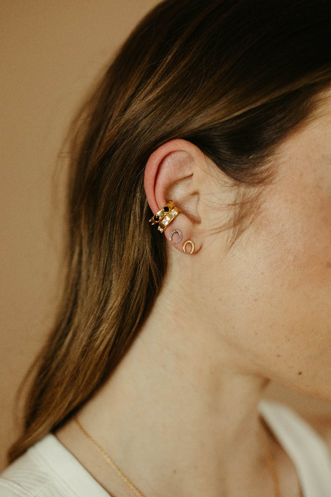 
                      
                        gold vermeil and black spinel Wild Card Ear Cuff with stones
                      
                    