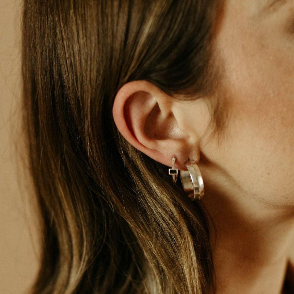 
                      
                        sterling silver and black spinel huggie Happy Hour Hoop Earrings
                      
                    