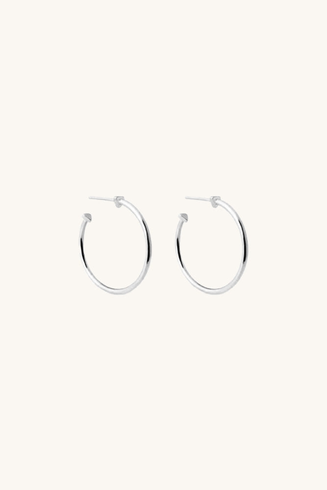 
                      
                        Medium sized 9 A.M. Hoop Earrings in Silver Sierra Winter
                      
                    