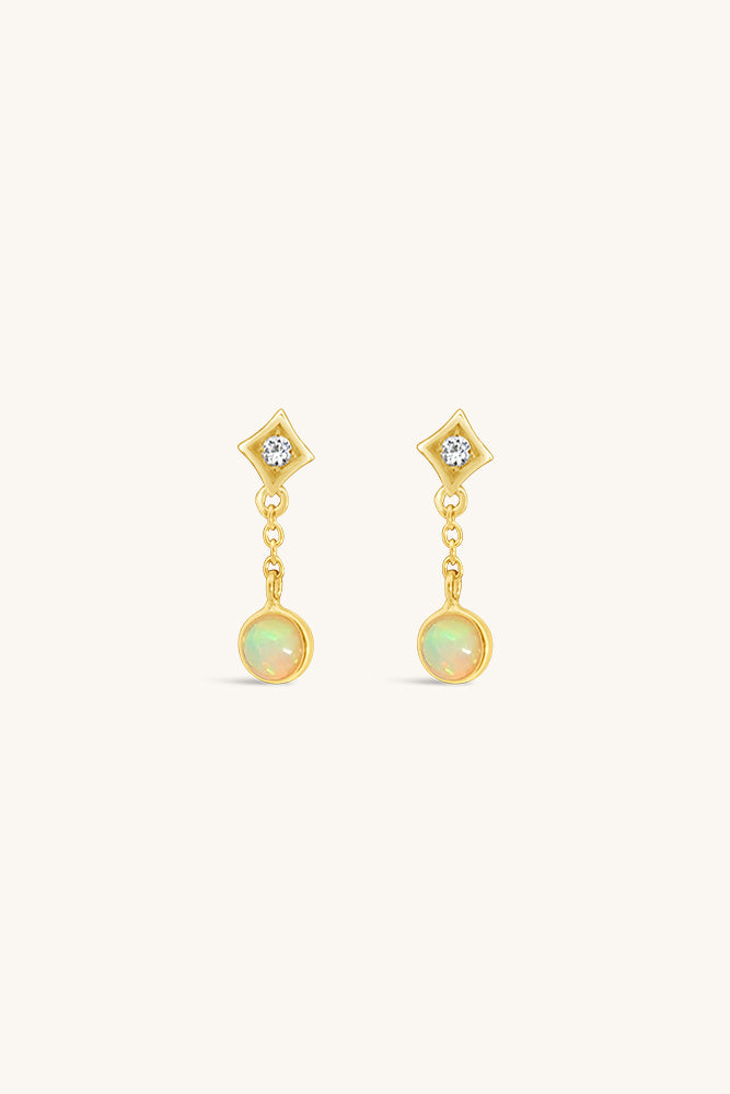 
                      
                        dainty opal white topaz aura earrings sierra winter
                      
                    