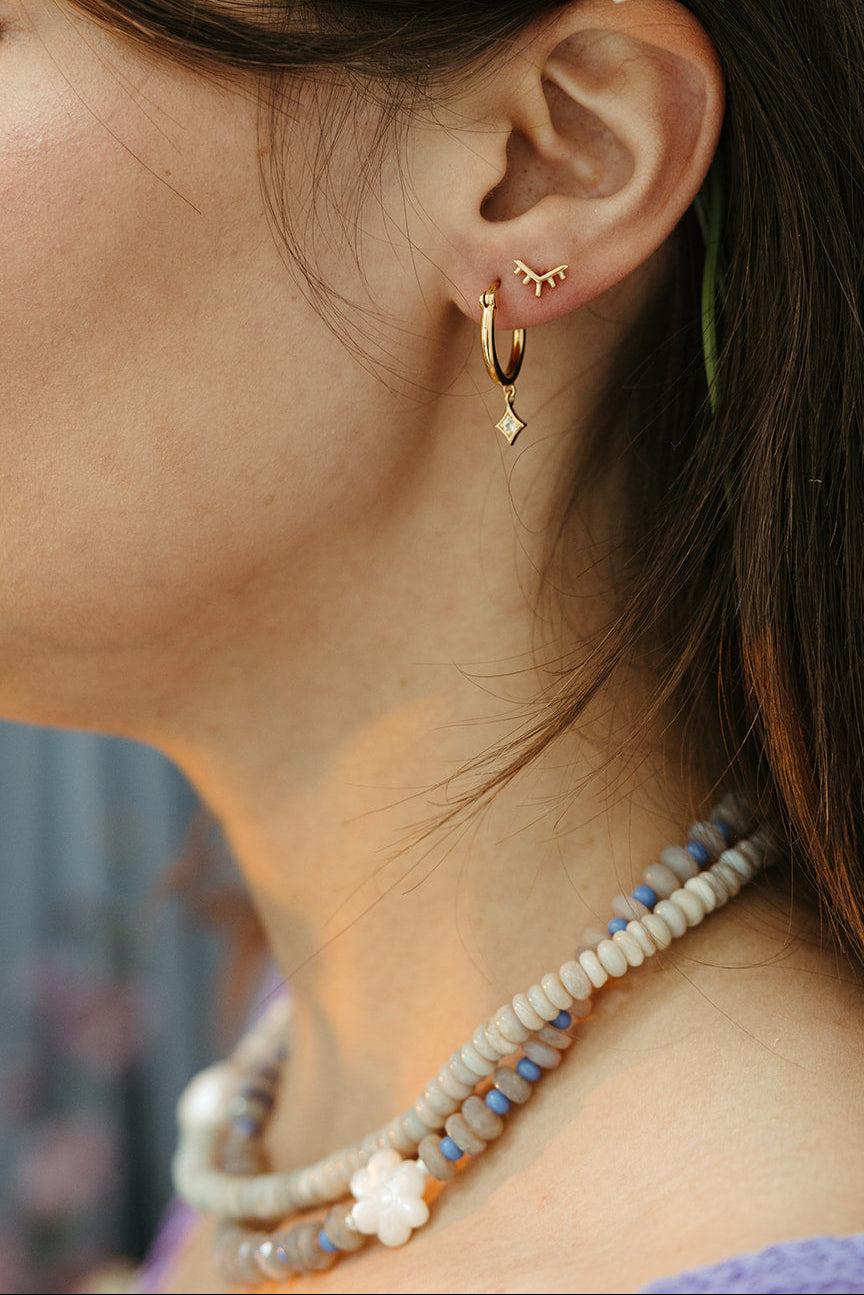 Gold sunrise stud earrings hoop white topaz sierra winter