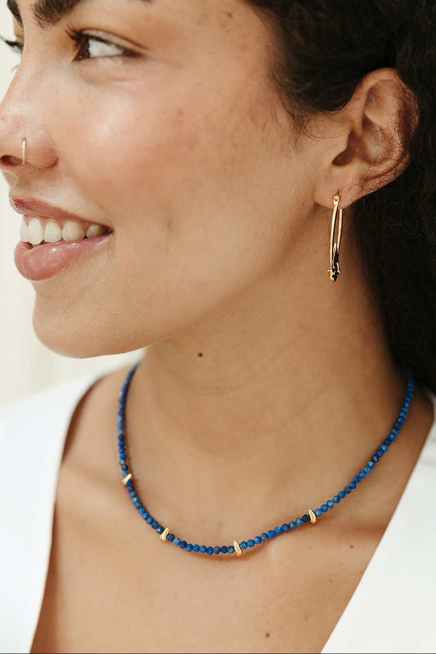 faceted lapis small beaded necklace with gold accents