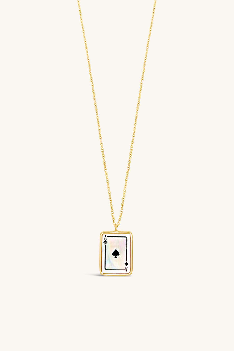 gold and mother of pearl playing card inspired token necklace sierra winter