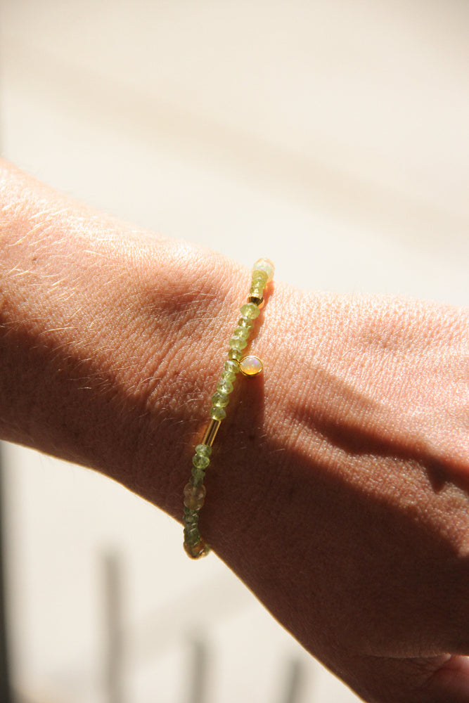 
                      
                        handmade beaded peridot, opal and gold vermeil bracelet
                      
                    