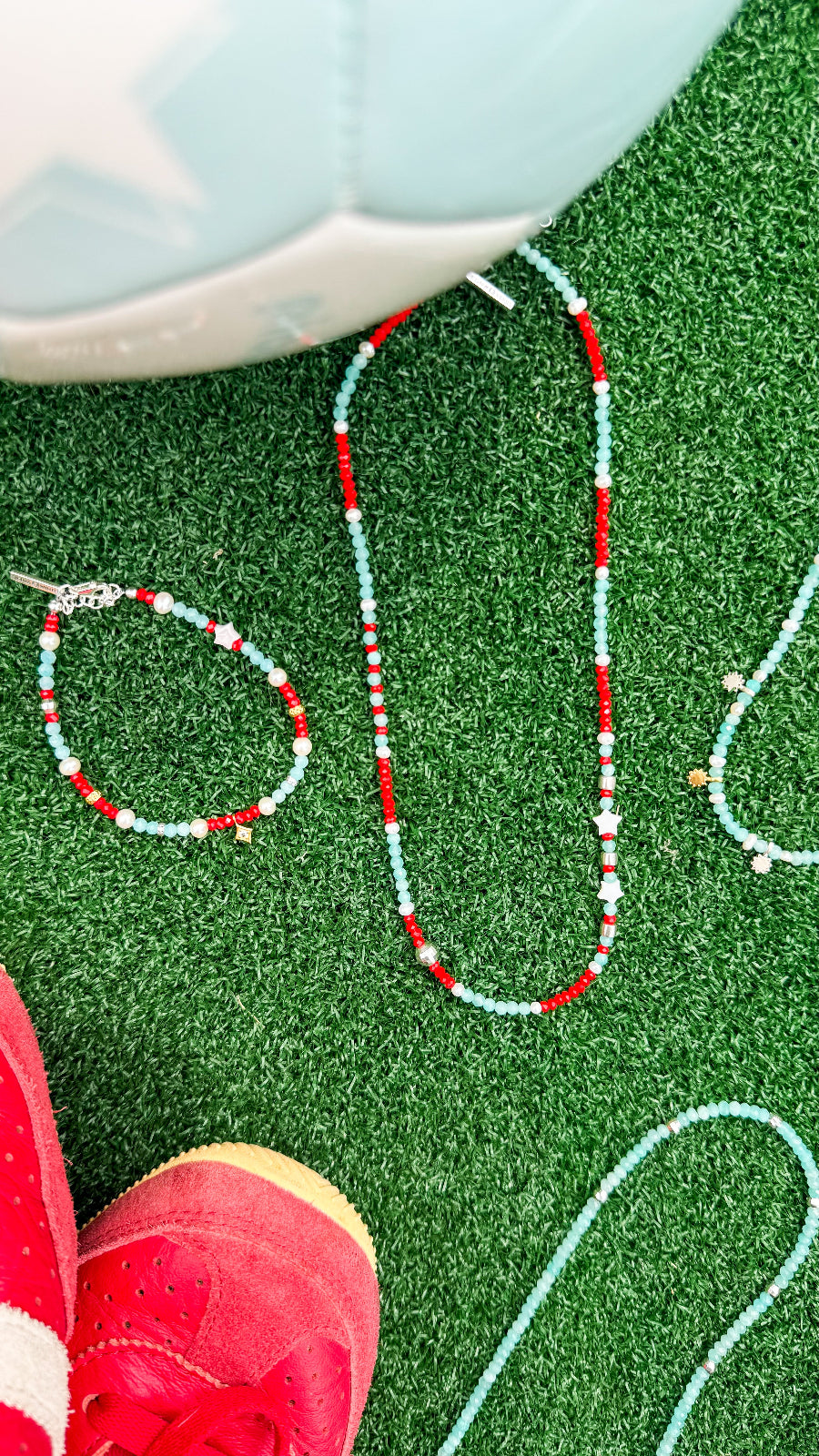 handmade teal and red beaded necklace with silver and pearl accents sierra winter