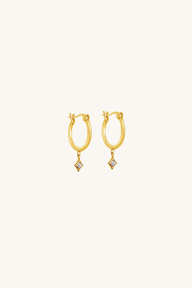 sierra winter gold vermeil white topaz lone star huggie hoop earrings