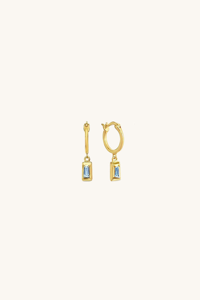 sierra winter jewelry  blue topaz huggie dangle hoops