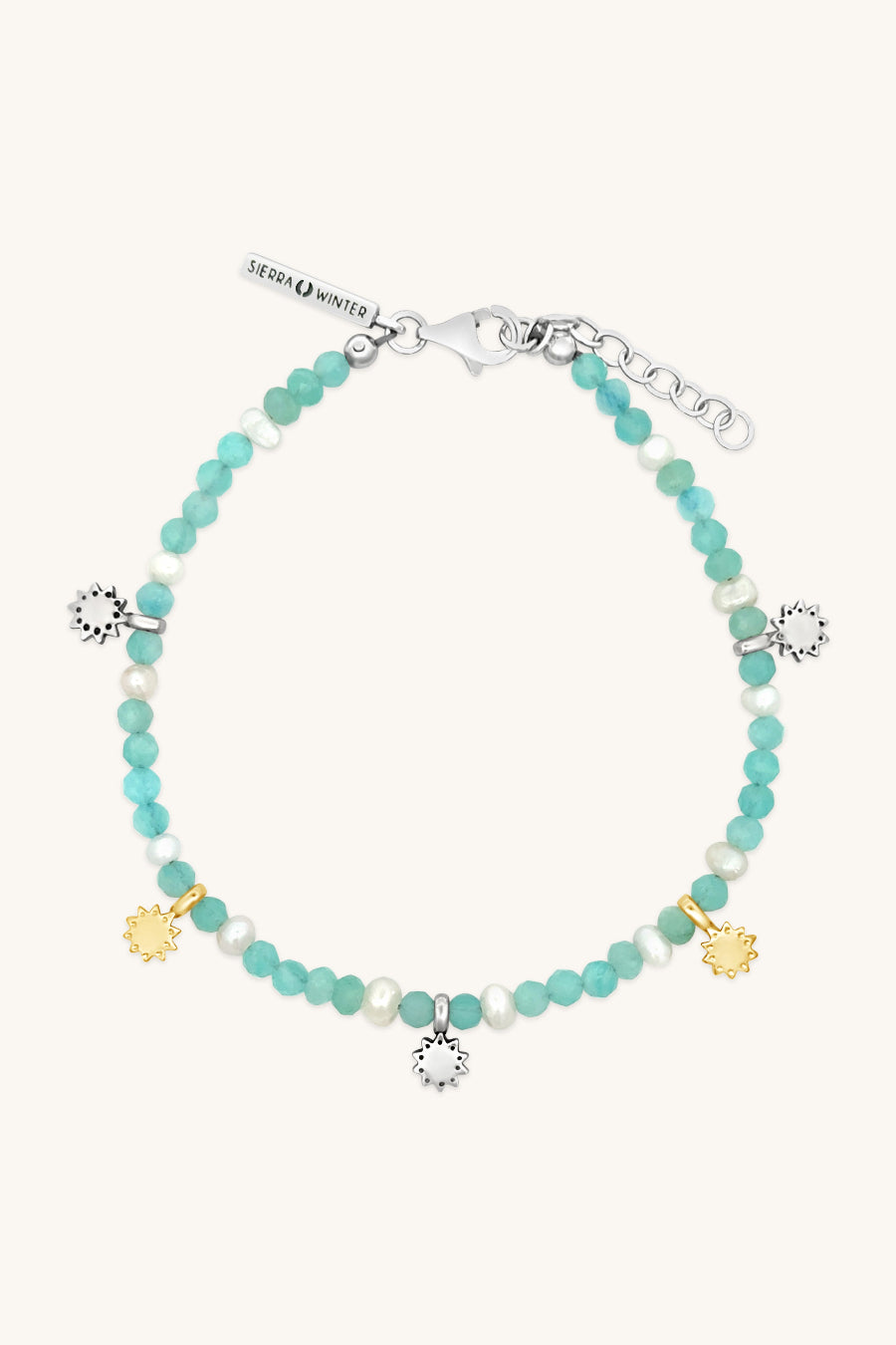 handmade teal beaded bracelet with gold and silver charm accents sierra winter