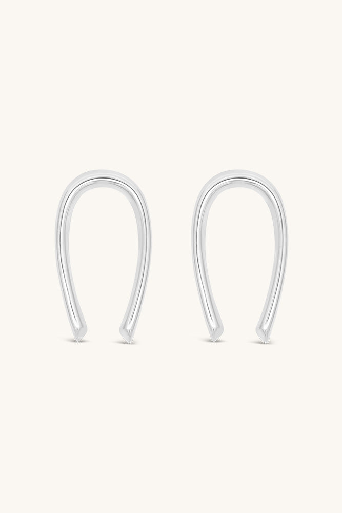 sierra winter sun child silver horseshoe earrings