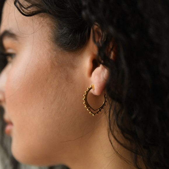 sierra winter gold textured buffalo mound hoop earrings