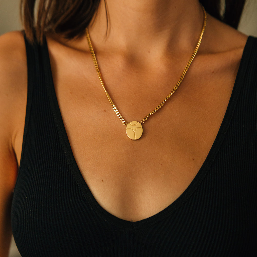 
                      
                        thick gold chain necklace scarab pendant
                      
                    