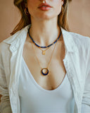 sierra winter jewelry gold vermeil blue topaz sun child pendant token necklace